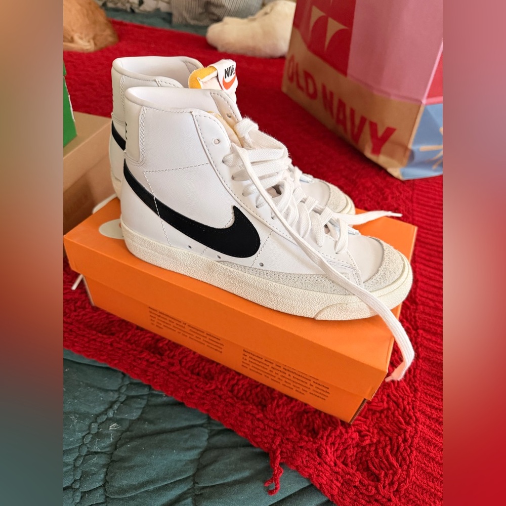 Nike White High-Top Sneakers with Black Swoosh - Picture 3 of 6